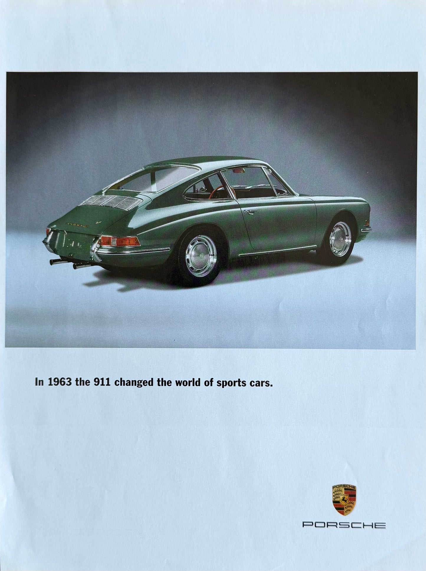 Porsche 911 – “1963’te Spor Otomobil Dünyasını Değiştirdi” Temalı Orijinal Dönem Reklam Sayfasıdır (Sonradan Baskı Değildir).