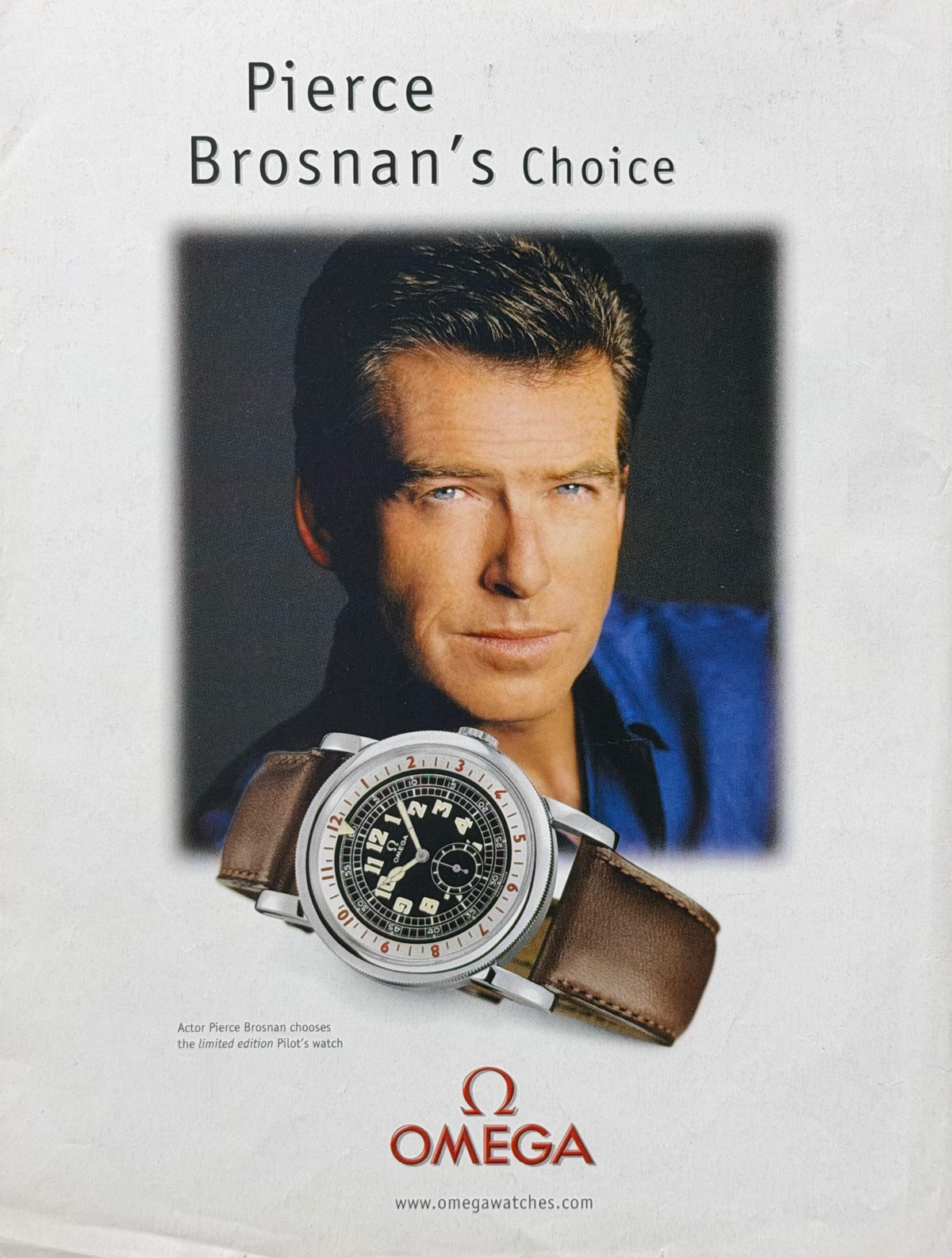 Omega 1938 Pilot’s Watch “Pierce Brosnan’s Choice” Orijinal Dönem Reklamıdır (Sonradan Baskı Değildir)