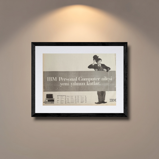 IBM Personal Computer “Yeni Yılınızı Kutlar” Charlie Chaplin Temalı 1980’ler Türkçe Orijinal Dönem Reklamıdır (Sonradan Baskı Değildir)